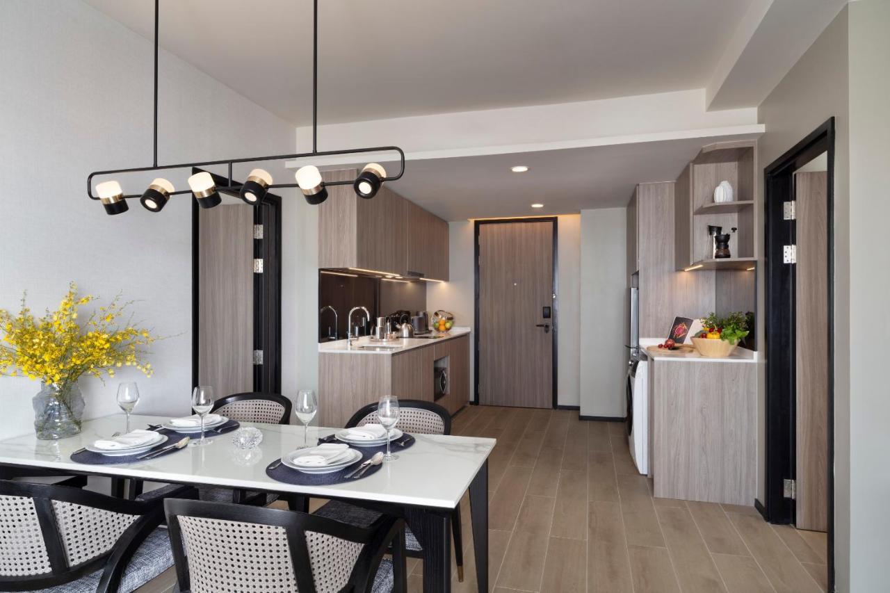 Somerset Pattaya Exteriér fotografie The kitchen and dining area of a typical apartment