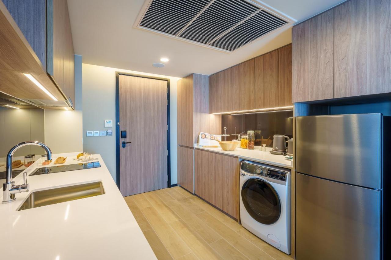 Somerset Pattaya Exteriér fotografie A kitchen in a 3-bedroom unit