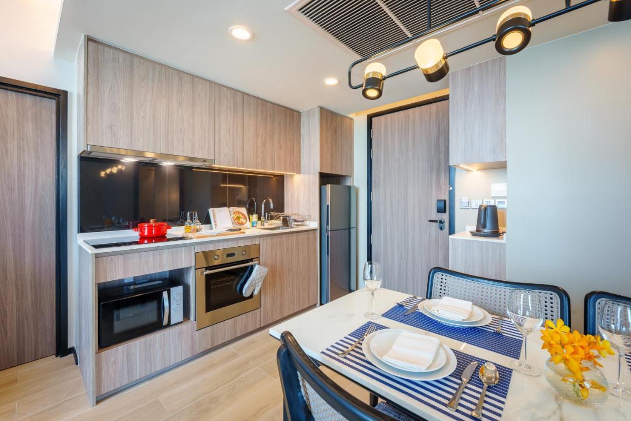 Somerset Pattaya Exteriér fotografie A kitchen in a serviced apartment in Singapore